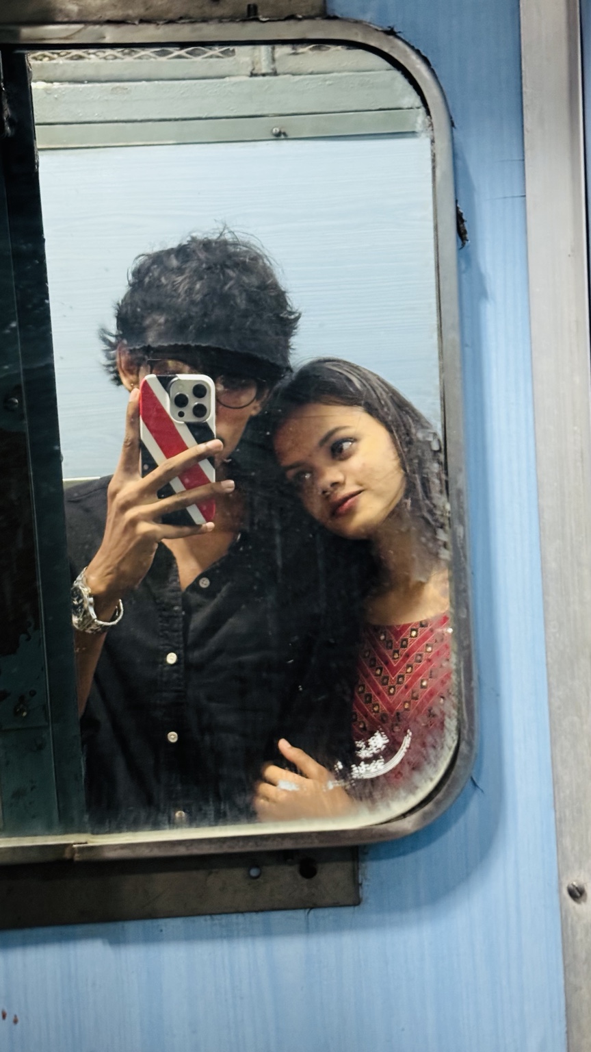 Us together, with Punnya leaning on my shoulder